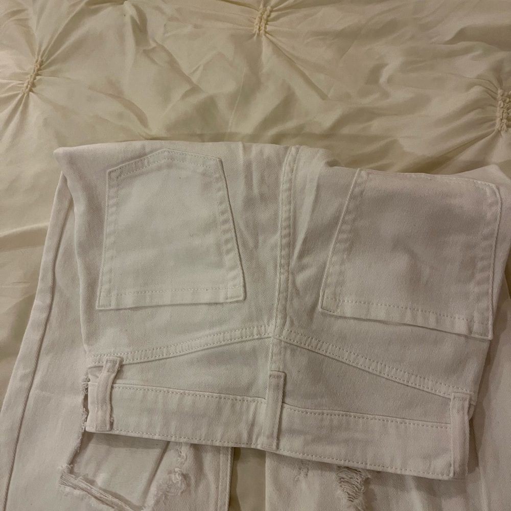 Ripped white straight leg jeans